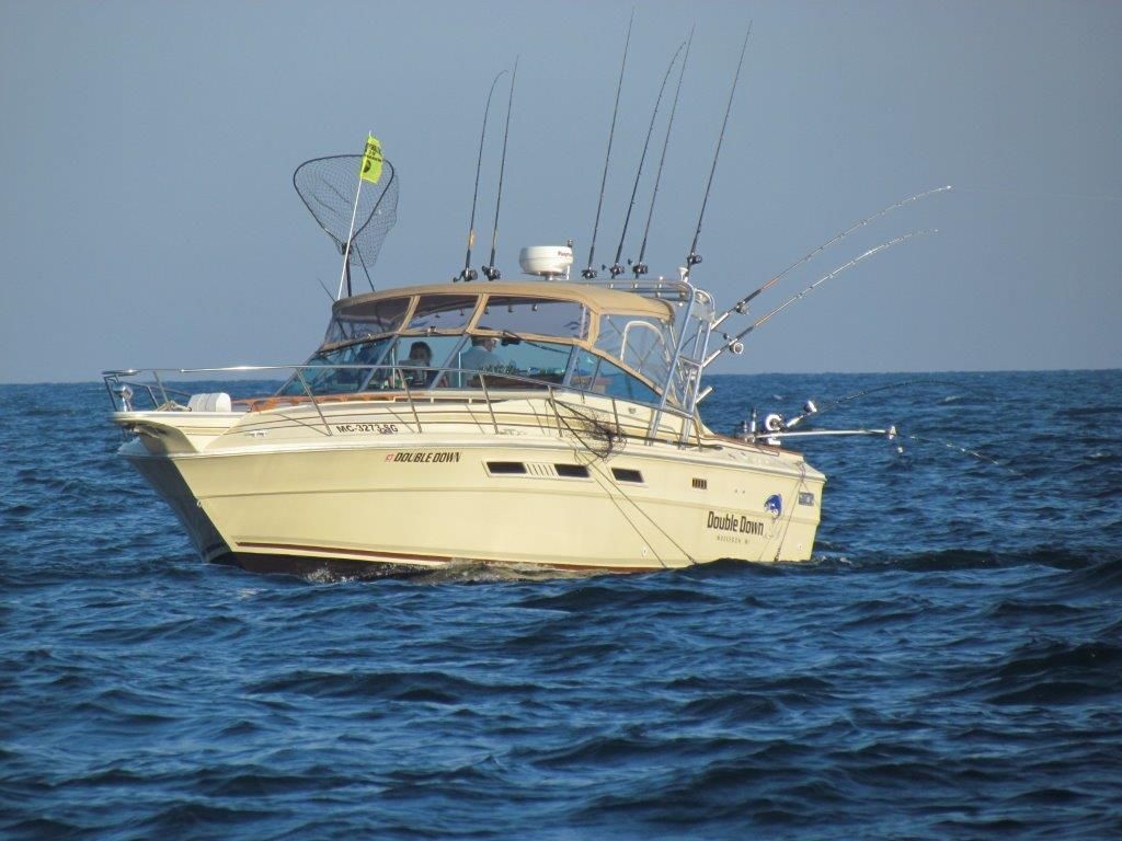 Double Down cruising open water with the rods out